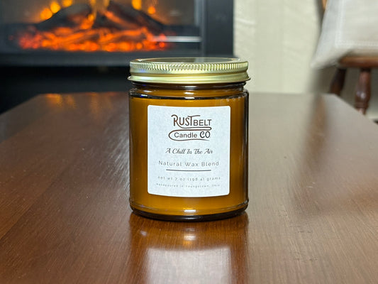 A Chill In The Air Scented Candle - White Wax In Amber Jar.