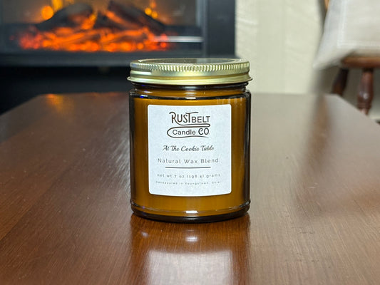 At The Cookie Table Scented Candle - White Wax In Amber Jar